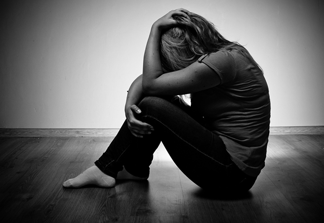 (Photo: Depressed woman via Shutterstock)
