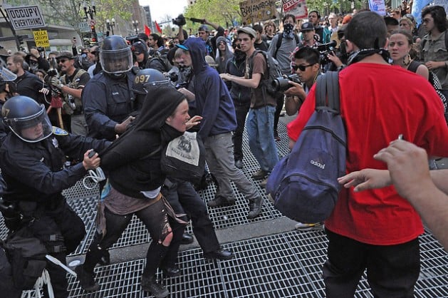 U.S. police arrest May Day protester in Oakland, California. (Photo: Judith Scherr/IPS)