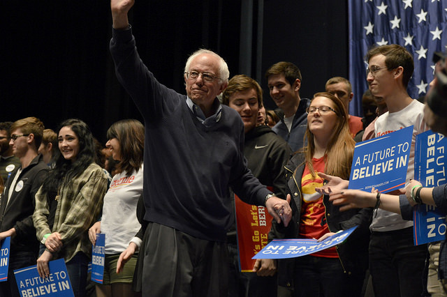 U.S. Sen. Bernie Sanders, 2016 Democratic presidential candidate, waves to the crowd after a town hall at Iowa State University in Ames, Iowa on Monday, Jan. 25, 2016. (Photo: Alex Hanson)
