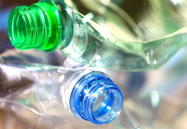 Bisphenol A, one of many endochrine disruptors, is used to manufacture many hard, clear plastic products, including some water bottles. (Photo: Plastic Bottles via Shutterstock)