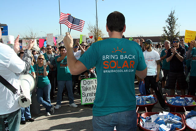 Solar worker speaks to crowd before a Nevada Public Utilities Commission meeting in Las Vegas on February 12, 2016. (Photo: Sam Lopaze)