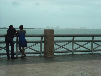 Photo: Danica Jorden. Couple enjoying Cancun’s Malecón Tajamar