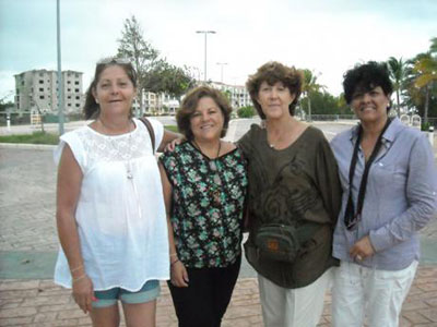 Photo by Danica Jorden. Patrícia Toscano (center right), with sister Yolanda and friends Alejandra and Aracely, collected signatures that led to a court injunction against further development.