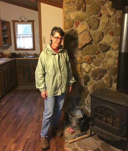 Susan Classen at her cabin. (Photo by the author)