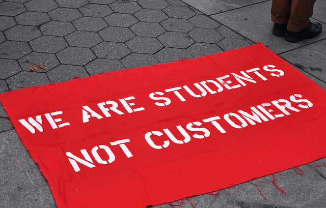 A sign lays on the ground during a demonstration outside of Cooper Union in New York City on December 8, 2012. (Photo: Michael Fleshman)
