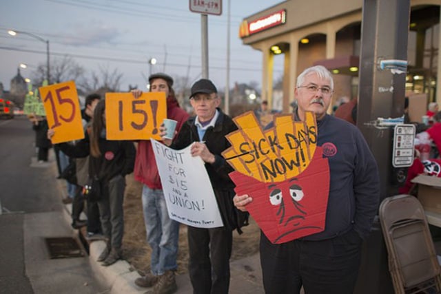 Protesters outside the McDonald’s in St. Paul, Minnesota called for a $15 per hour minimum wage, paid sick days and union rights on April 14. (Wikimedia Commons / Fibonacci Blue)