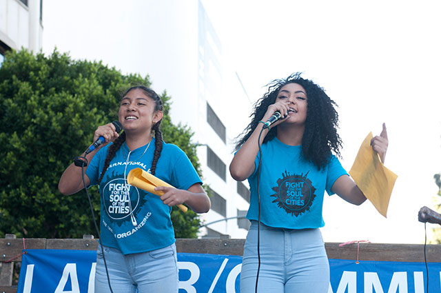 Los Angeles high school students lead chants calling for police to remove military weapons from their schools. (Photo courtesy of Labor Community Strategy Center)