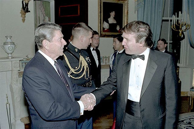 Donald Trump is greeted by President Ronald Reagan at a 1987 White House reception in Washington, D.C. (Photo: Ronald Reagan Presidential Library)