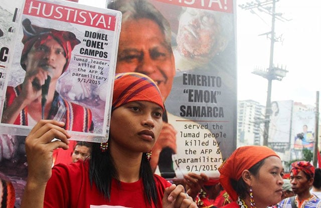 Michelle Campos holds a picture of her father, who was killed in September 2015 in the Mindanao region of the Philippines, as were Campos’ grandfather and schoolteacher. They had all spoken out against mining in the region. (Photo by Tulda Productions, used with permission courtesy of Global Witness.)