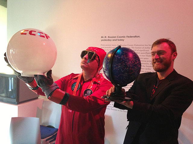Bogad as cosmonaut collaborates with dissident Russian artist Arseniy Zhilayev, 2014. (Credit: Ballitronica)