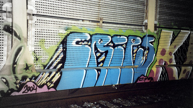 Graffiti for the Crips, a street organization, lines train tracks in Birmingham, Alabama, in a photo taken on November 29, 2007. (Photo: Bo Hughins; Edited: LW / TO)