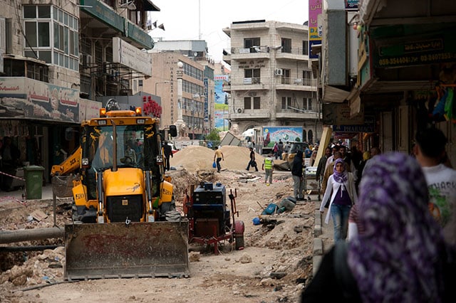 Construction equipment rolls through Ramallah, Palestine, on April 29, 2011. (Photo: Michael Rose)