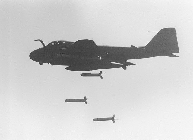 An A-6E Intruder aircraft drops CBU-59 cluster bombs over Iran, April 18, 1988.