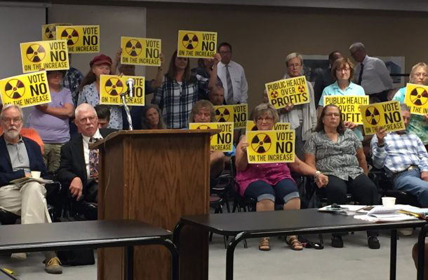 People who live near the IHD landfill in western North Dakota gather in Bismarck, North Dakota, to ask the North Dakota Health Council not to increase radiation limits for oil field waste in landfills. (Photo: Dakota Resource Council)