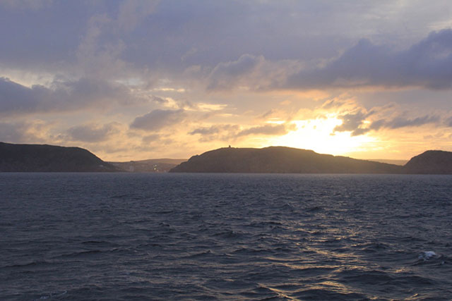 The sun sets behind Signal Hill, Newfoundland. (Photo: Chris Williams)