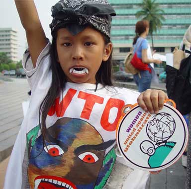 A WTO protest in Jakarata, Indonesia. NAFTA lawsuits that benefited corporate profits at the expense of democratic institutions and environmental regulations helped trigger global resistance to other international trade agreements. (Photo by Jonathan McIntosh licensed under the Creative Commons Attribution-Share Alike 2.5 generic license)