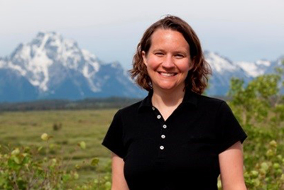 Gina Macllwraith stands in Teton National Park in Wyoming. Macllwraith spent over ten years working to reduce waste streams in national parks across the West. (Photo: Gina Macllwraith)
