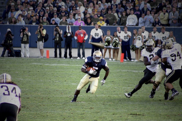 Notre Dame and Purdue University students play football in a game on September 4, 2010. (Photo: kevingwelch; Edited: LW / TO)