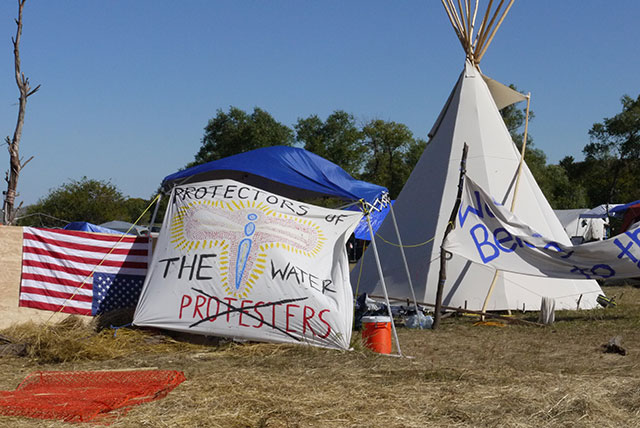 A Water Protector camps out at the Oceti Sakowin Camp along the Cannonball River at Standing Rock in September 2016. (Photo: Sarah Jaffe)