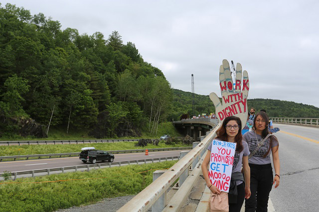 Zully Palacios leading the 13-mile march on the Ben & Jerry’s factory. (Photo: Jonathan Leavitt)