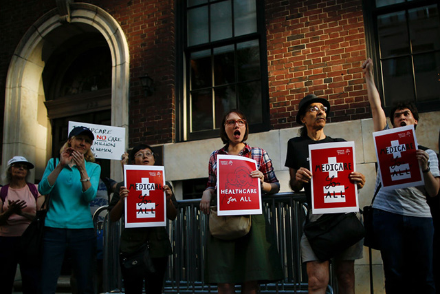 A group of activists rally against the GOP health care plan outside of the Metropolitan Republican Club, July 5, 2017 in New York City. (Photo: Drew Angerer / Getty Images)
