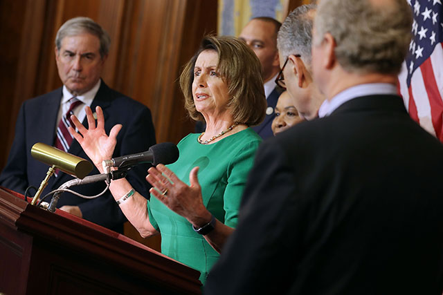 House Minority Leader Nancy Pelosi (D-CA) is joined by House Budget Committee ranking member John Yarmuth (D-KY) (L) and fellow Democrats from the House and Senate during a news conference in the Rayburn Room at the U.S. Capitol April 28, 2017 in Washington, DC. (Photo: Chip Somodevilla / Getty Images)