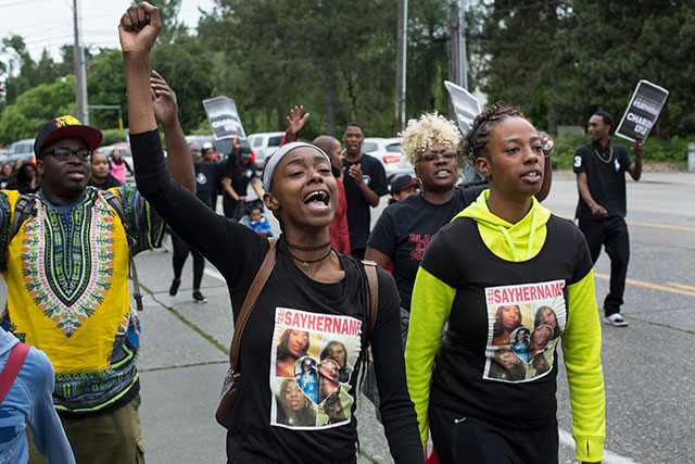 Family members of Charleena Lyles, including her sister, Monika Williams (R), lead a march through north Seattle on June 20, 2017 in Seattle, Washington. Officers from the Seattle Police Department shot and killed Lyles, a pregnant mother of four, on June 18. (Photo: David Ryder / Getty Images)