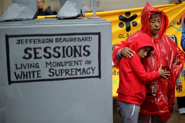 Genoveva Ramirez and her grandson Mariano Castellanos, 7, both of Chicago, join fellow protesters in front of the Department of Justice to demonstrate against the Trump Administration's decision to end the 2012 Deferred Action for Childhood Arrivals (DACA) policy September 6, 2017, in Washington, DC. (Photo: Chip Somodevilla / Getty Images)
