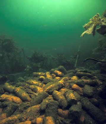 An underwater munition dump site. According to Terrance Long, chair and CEO of the International Dialogue on Underwater Munitions in the Hague, there could be as many as 1000 separate dump sites in the coastline surrounding the continental U.S., many of them currently undocumented. (Photo: Courtesy of the International Dialogue on Underwater Munitions)