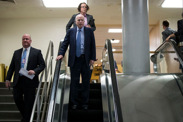 Sen. John McCain heads back to his office following a vote on amendments to the fiscal year 2018 budget resolution, on Capitol Hill, October 19, 2017 in Washington, DC. (Photo:  Drew Angerer / Getty Images)