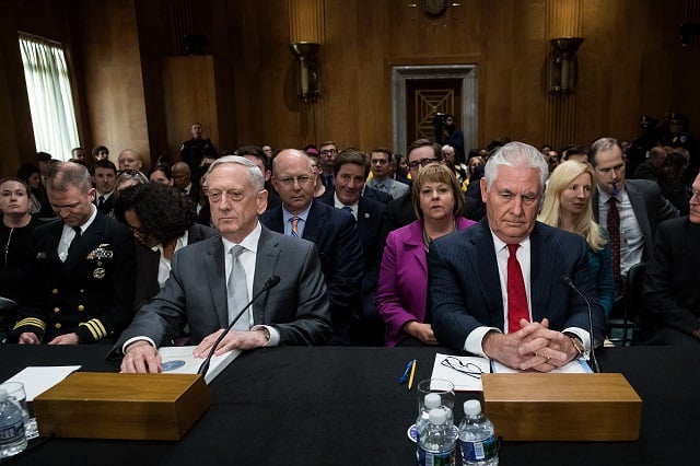 U.S. Secretary of Defense James Mattis and U.S. Secretary of State Rex Tillerson take their seats as they arrive for a Senate Foreign Relations Committee hearing concerning the authorizations for use of military force, October 30, 2017 in Washington, DC. As Mattis and Tillerson face questions about the administration's authority to use military force, Congress is still seeking more information about the deadly ambush that killed four U.S. troops in Niger. (Photo by Drew Angerer/Getty Images)