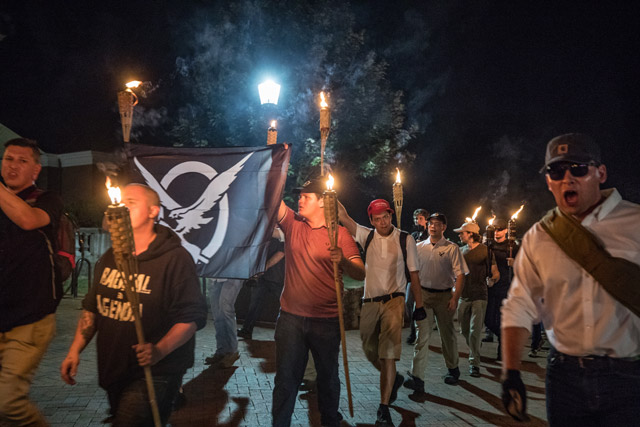 Chanting White lives matter, You will not replace us, and Jews will not replace us, several hundred white nationalists and white supremacists carrying torches marched in a parade through the University of Virginia campus. The alt-right is not a new occurrence, just a new name, argues David Neiwert. (Photo: Evelyn Hockstein for The Washington Post via Getty Images)