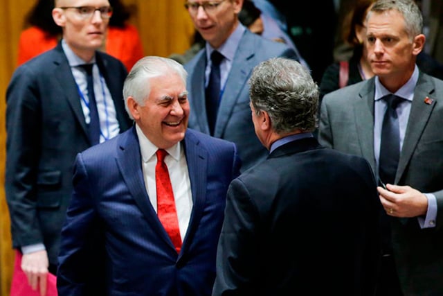 US Secretary of State Rex Tillerson (left) speaks with delegates as he arrives to attend the UN Security Council Ministerial Briefing on Non-Proliferation and the DPRK, at the United Nations, on December 15, 2017, in New York. (Photo: EDUARDO MUNOZ ALVAREZ / AFP / Getty Images)