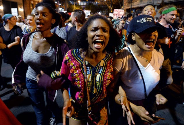 Protesters chant Black Lives Matter as they march throughout the city of Charlotte, North Carolina, on Friday, September 23, 2016. (Photo: Jeff Siner / Charlotte Observer / TNS via Getty Images)