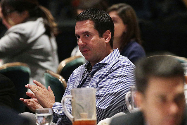 Rep. Devin Nunes, Chairman of House Intelligence Committee, listens to President Donald Trump's remarks during a lunch at the 2018 House & Senate Republican Member Conference February 1, 2018, at the Greenbrier resort in White Sulphur Springs, West Virginia. (Photo: Alex Wong / Getty Images)