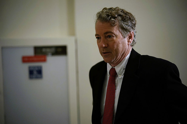 Sen. Rand Paul walks back to his office a TV interview at Russell Senate Office Building on Capitol Hill February 8, 2018 in Washington, DC. Sen. Paul made a move to block a budget deal Thursday as the government will run out of funding at midnight for seeking to vote on an amendment to restore budget caps. (Photo: Alex Wong / Getty Images)