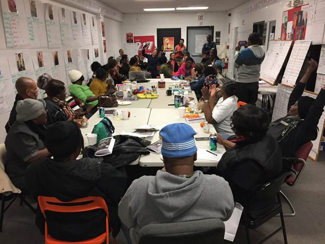 Hilton worker committee along with Hyatt workers hold one of their weekly meetings to plan campaign tactics. (Photo: Unite Here Local 217)