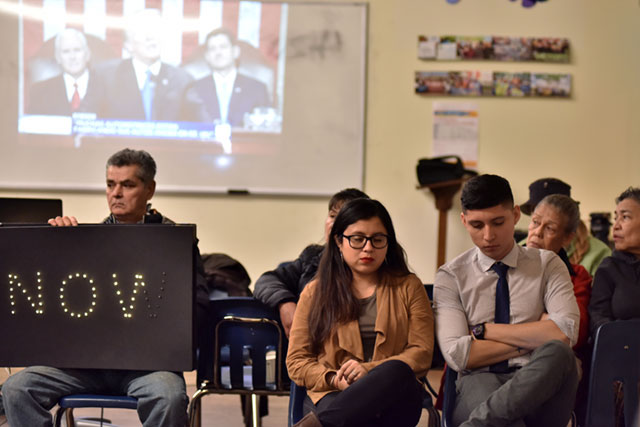 DACA recipients and Dreamers Yatziri Tovar, student of Political Sciences at City College, and Anthony Alarcon, student of Film Studies, turn theirs backs on President Donald Trump on screen during the State of Union speech on January 30, 2018, in New York City. (Photo: Joana Toro / VIEWpress / Corbis via Getty Images)