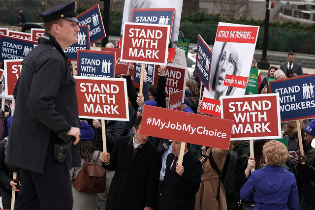 Activists rally in front of the U.S. Supreme Court February 26, 2018 in Washington, DC. The court was scheduled to hear the case, Janus v. AFSCME, that could affect public-sector unions nationwide. (Photo by Alex Wong / Getty Images)