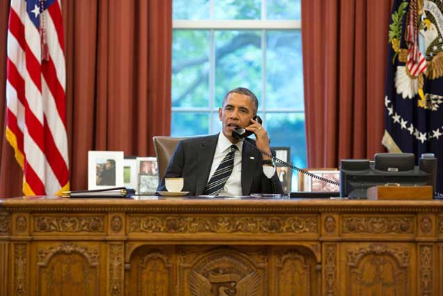 President Barack Obama talks with President Hassan Rouhani of Iran during a phone call in the Oval Office, Sept. 27, 2013. (Photo: Pete Souza / White House) 