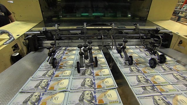 New $100 dollar notes on the presses at the United States Bureau of Engraving and Printing in Washington, DC. (Photo: Federal Reserve)
