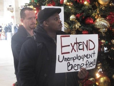 Christmas tree backdrop as unemployed protest cuts in EUC three days after Christmas. (Photo: Adam Goldman)