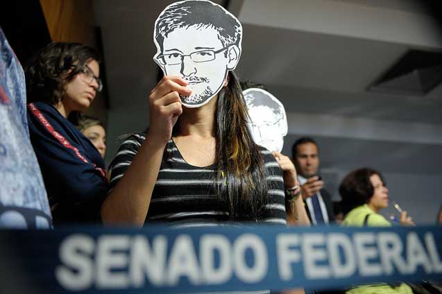 Supporters of Edward Snowden rally in Brazil.