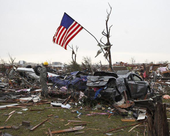 The 2013 tornado season was in the top six stories. Here, members of the Oklahoma National Guard's 63rd Civil Support Team conduct search and rescue operations in response to the May 20, 2013, EF-5 tornado that ripped through the centre of Moore, Oklahoma. (Credit: National Guard/cc by 2.0)