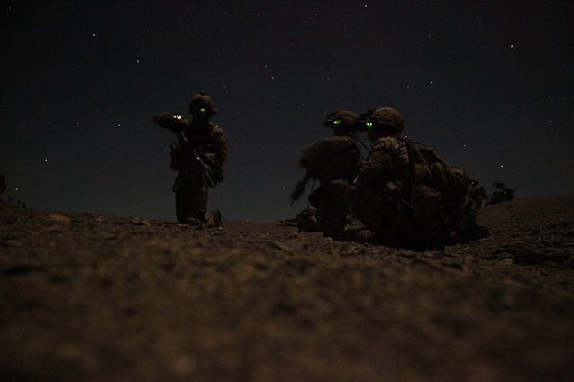 Members of a combined Afghan and coalition security force maintain security during an operation in search of a Haqqani network facilitator in Sarobi district, Paktia province, Afghanistan, October 17, 2011. The facilitator provided safe havens, money and supplies to network leaders throughout the region. (Photo: <a href=