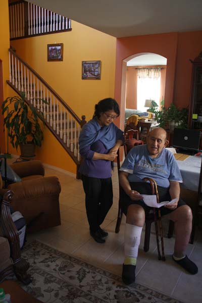Richard and Ofelia Covos moved into their home on Front Street in Autumnwood in 2008. Since then, Ofelia has suffered from a series of chronic respiratory problems, including sinusitis and bronchitis. (Photo: Daniel Ross)