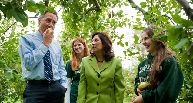 Peter Shumlin, Governer of Vermont, U.S. Department of Labor Secretary Hilda Solis, and Vermont Technical College students sample apples at the VTC orchard during a visit to Vermont Technical College in Randolph Vt. on Tuesday, Oct. 2, 2012.
