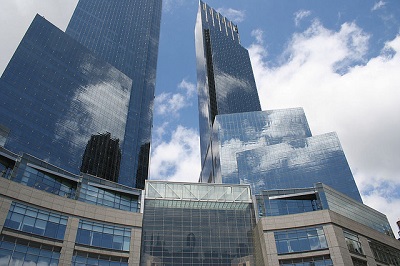 The Time Warner Center and the Hearst Magazine building in New York. As of 2011, 90 percent of the media/telecommunications industry was controlled by just six massive corporations, including Time Warner. (Photo:<a href=