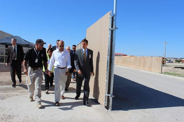 Homeland Security Seretary Jeh Johnson, center, visits the immigrant detention facility in Artesia, New Mexico, July 2014.
