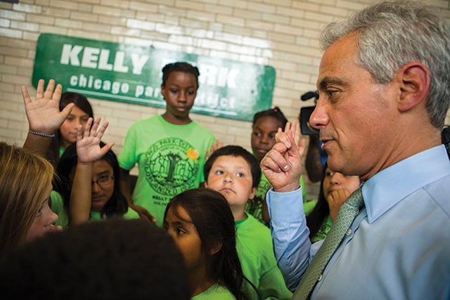 Mayor Rahm Emanuel announces playground improvements at Kelly Park in Brighton Park. Over the past few months, as Emanuel gears up for the mayoral campaign, he has announced a number of school and park playground improvements. (Photo: Emily Jan)
